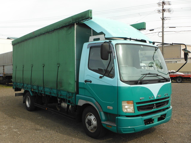 三菱ふそう ファイター 中型 幌車 PA-FK74F(1699) 1枚目